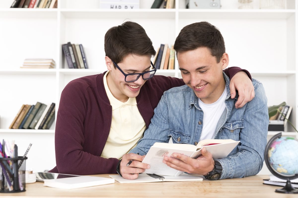 A parent and student reviewing notes after a session